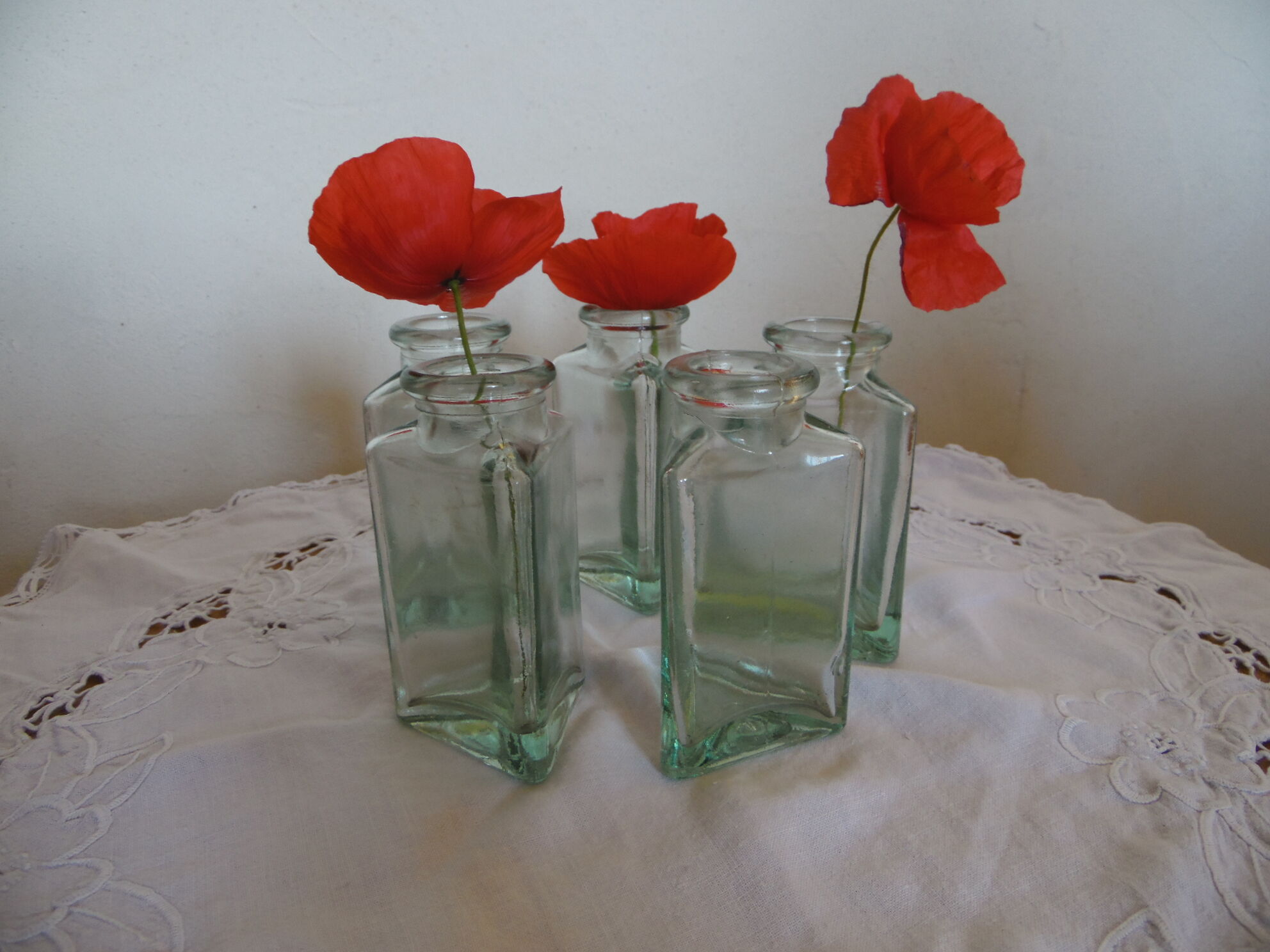 Lot of 5 triangular glass apothecary bottles