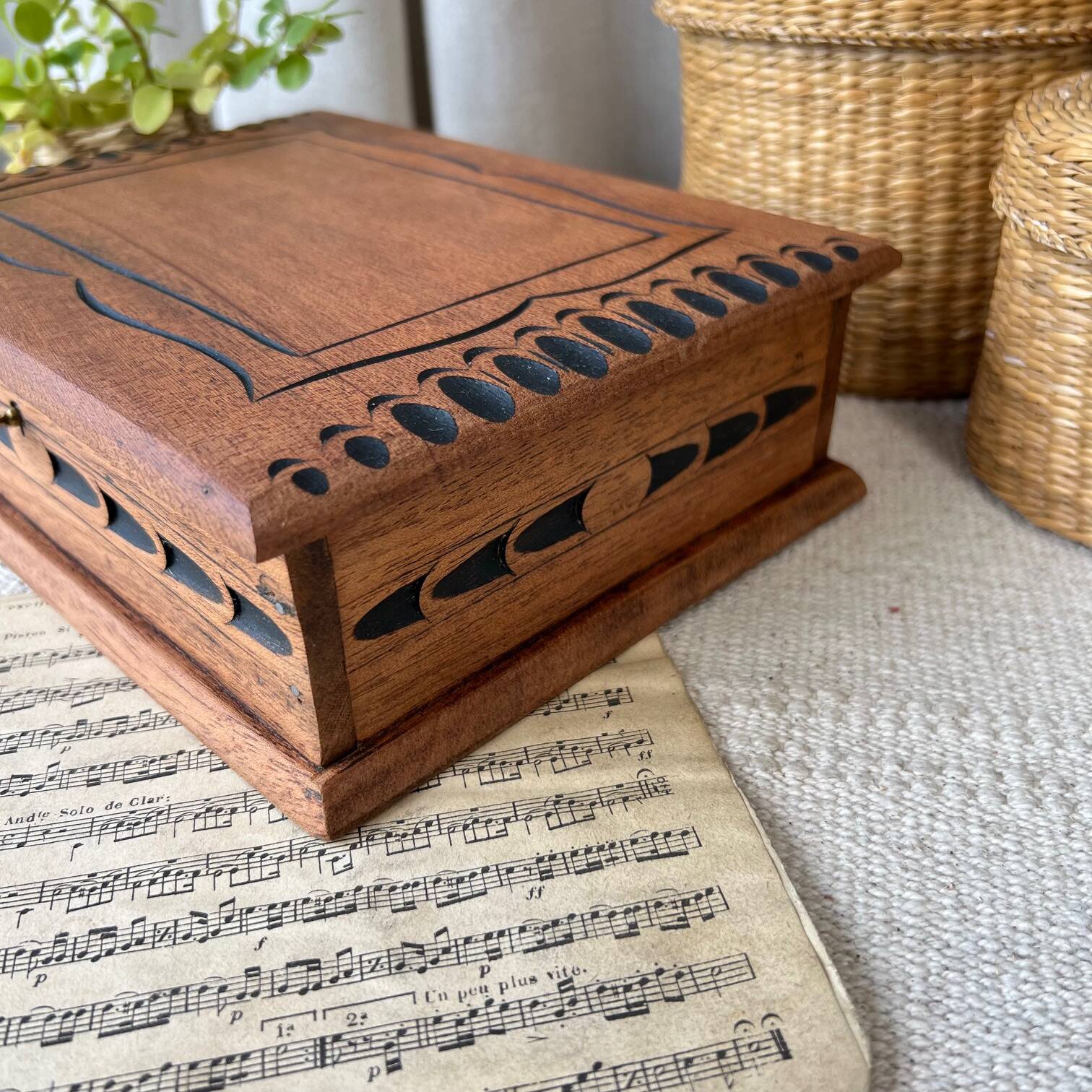 Carved wooden box with key