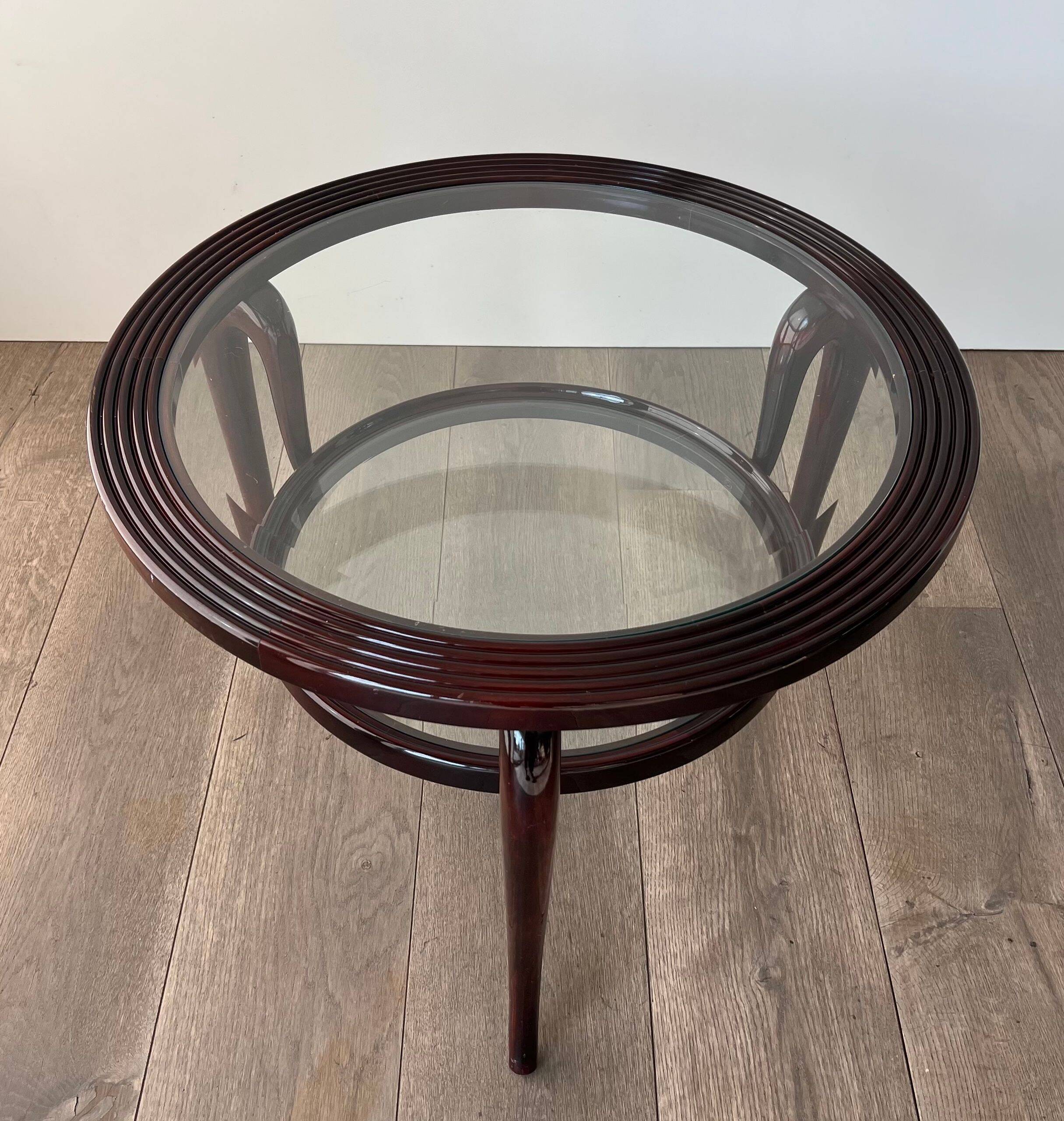 Round mid-century coffee table in walnut with a double top by Paolo Buffa.