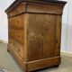 Commode Restauration XIXème en merisier et dessus marbre noir