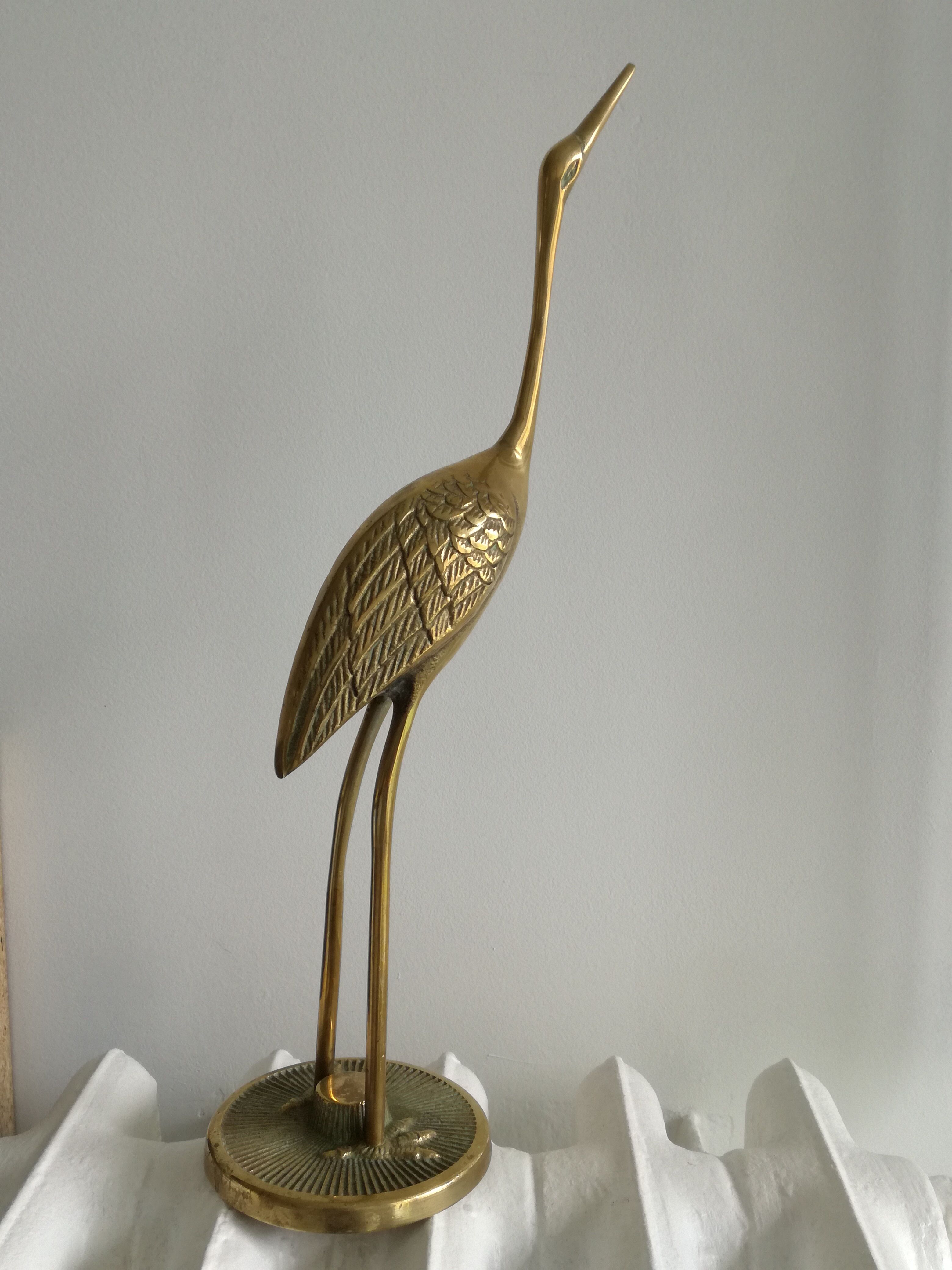 Heron vintage brass