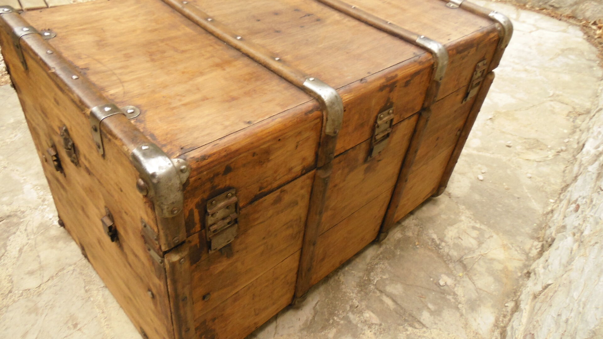 Former large wooden and iron trunk