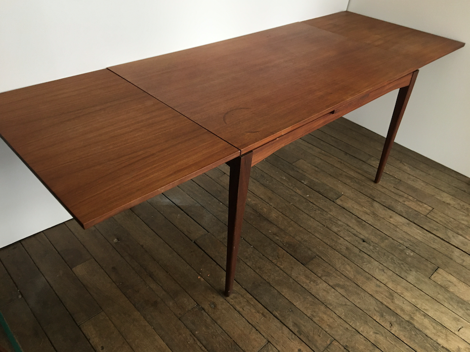 Teak dining table with extensions