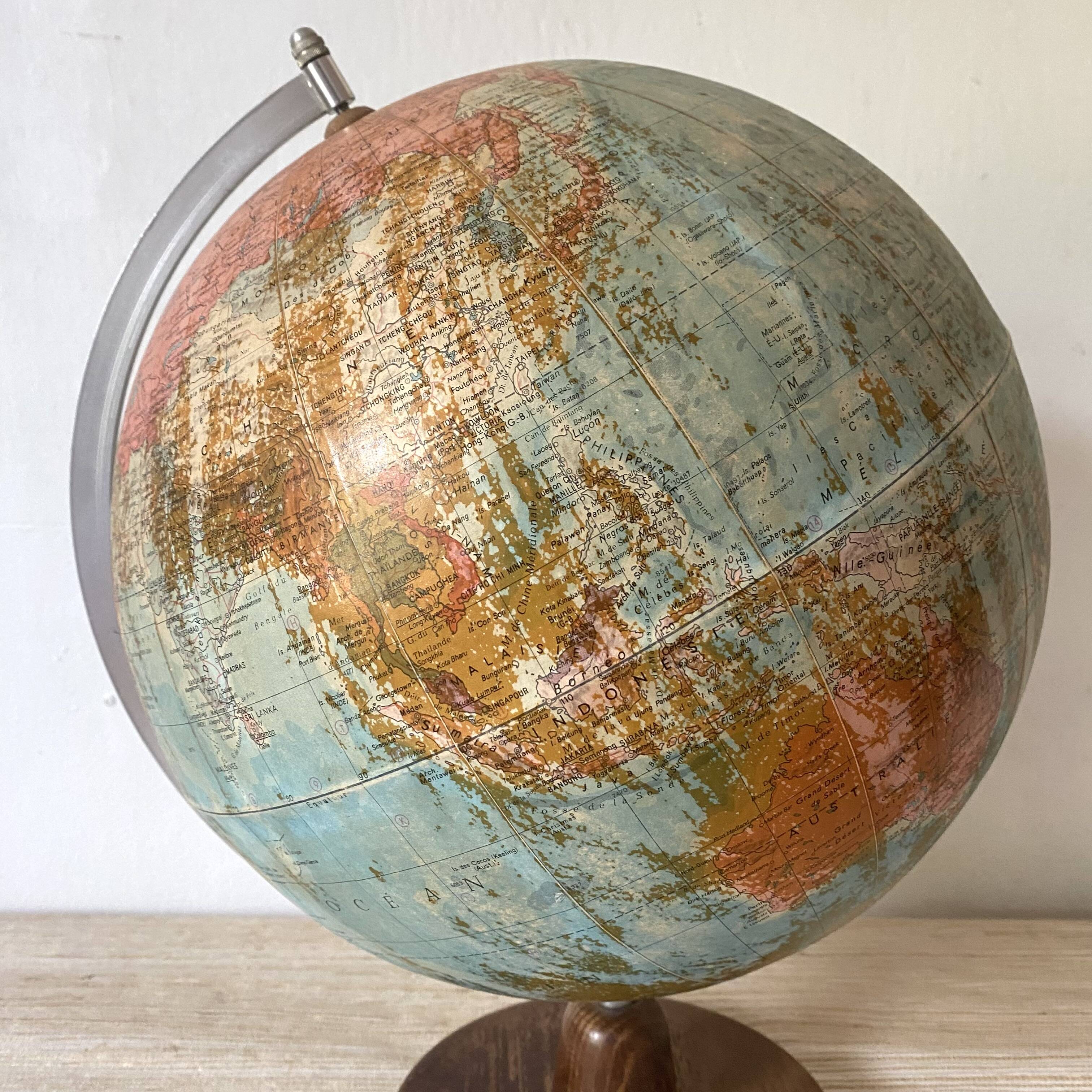 Old terrestrial globe with wooden base H46 cm