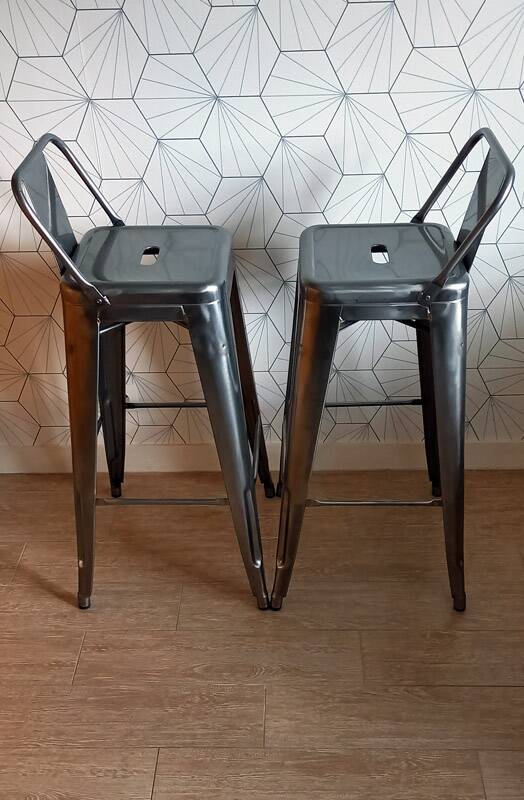 Pair of tolix hpd 75 stools – in varnished raw steel.