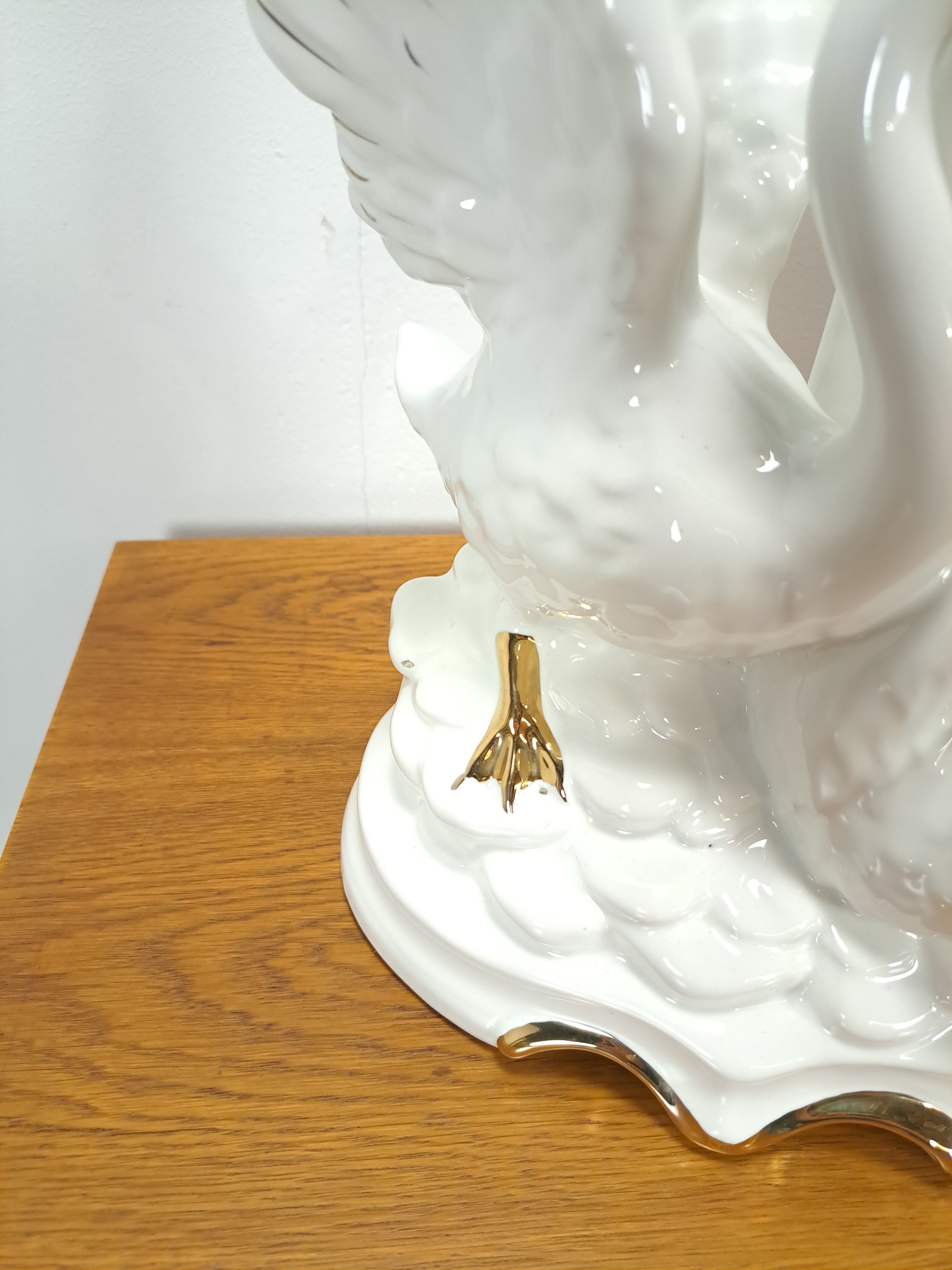 Porcelain lamp swans with vintage gold details
