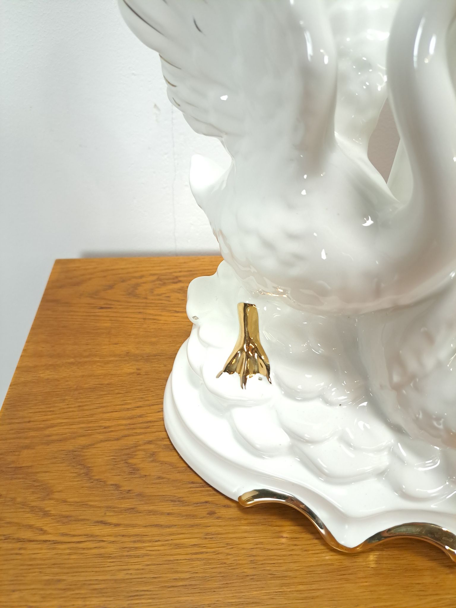 Porcelain lamp swans with vintage gold details