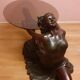 Coffee table, young woman in resin, smoked and beveled glass