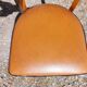 6 vintage 1960s wooden bistro chairs with camel faux leather.