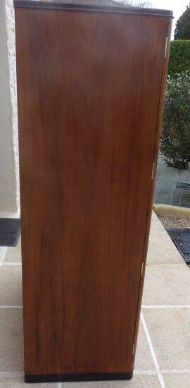 Wardrobe on a plinth in walnut and walnut veneer circa 1940.