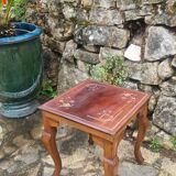 Coffee table in brass marquetry