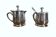 Two small silver-plated metal tea service pots from the 20th century.