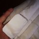 Antique embroidered linen sheet with a monogram.