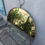 Round patinated mirror
