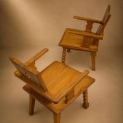 Pair of brutalist armchairs, oak, France, circa 1950.