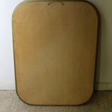 Faceted mirror and gold brass pare closes