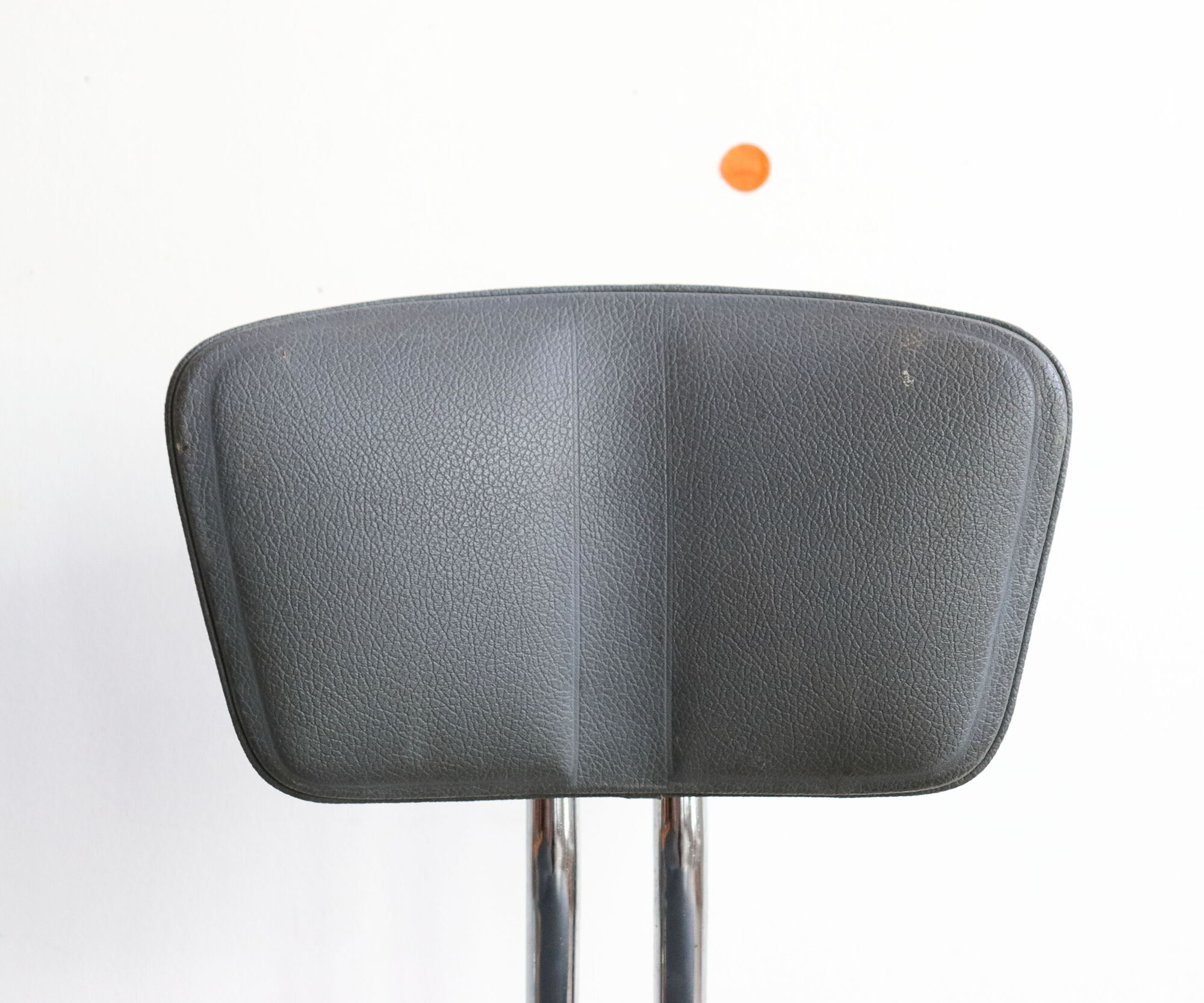 Pair of workshop chairs from the 50s in chrome steel and imitation leather