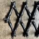 Napoleon III hinged wall-mounted coat rack in black wood