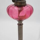 Old metal and pink glass oil lamp