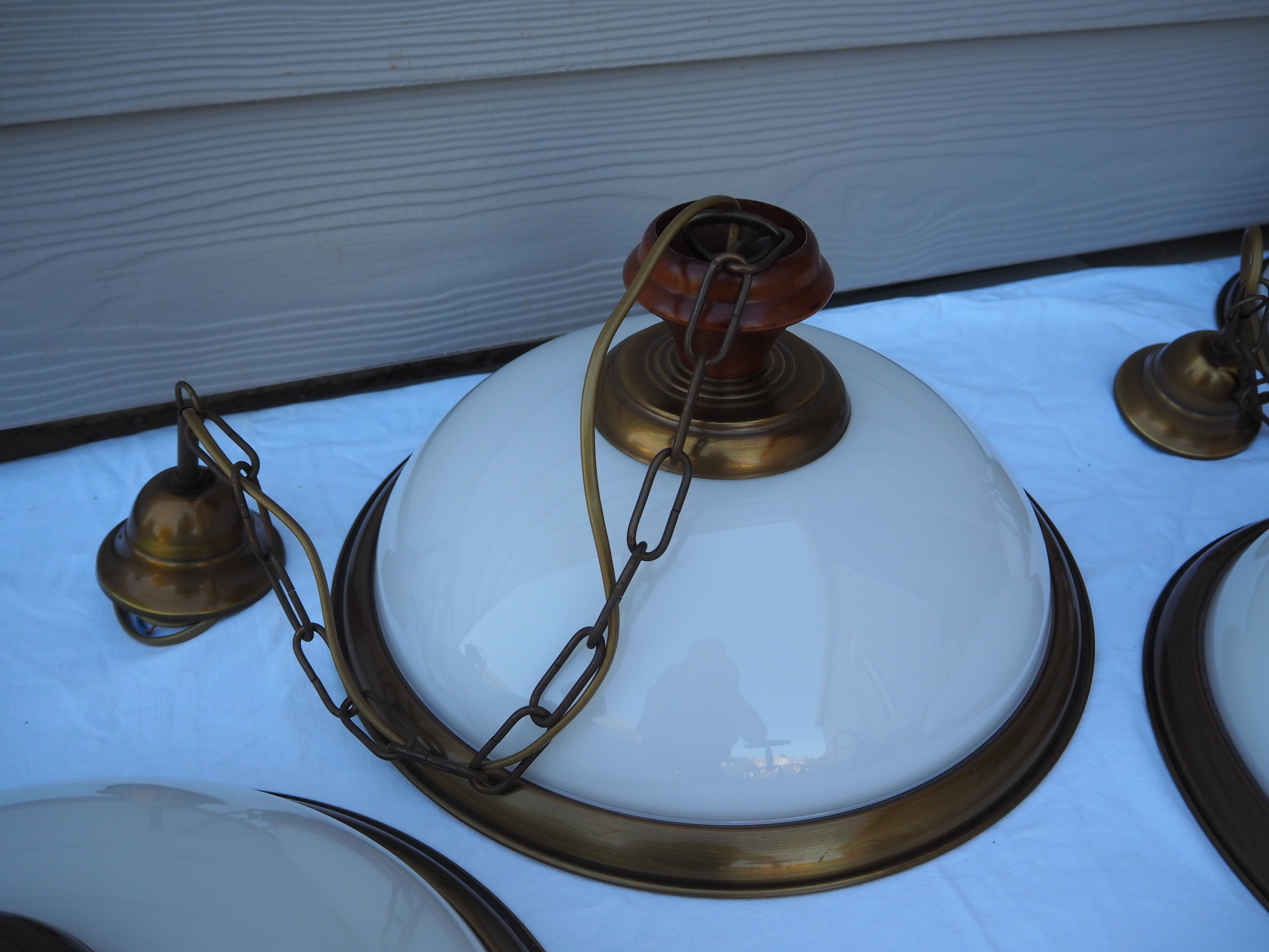 Suspension in white opaline, its edge in aged brass