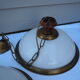 Suspension in white opaline, its edge in aged brass