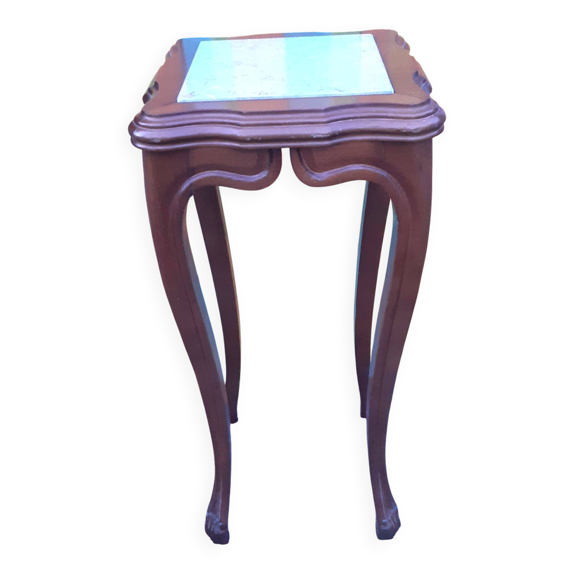 Curved leg wooden stand with a marble top.