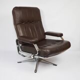 A pair of leather armchairs, 1970s