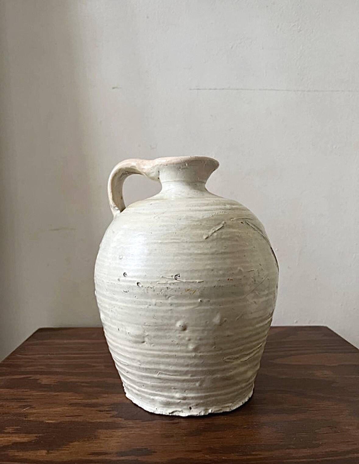 Wabi-sabi amphora vase in off-white and glazed, France circa 1970.