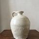 Wabi-sabi amphora vase in off-white and glazed, France circa 1970.