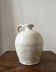 Wabi-sabi amphora vase in off-white and glazed, France circa 1970.