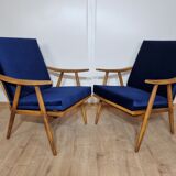 Boomerang" model armchairs by Ton