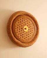 Rattan wall sconces