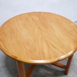 Vintage extendable round wooden dining table