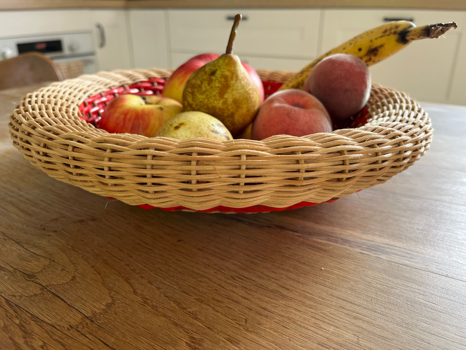 Rattan basket with red trim