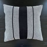Woven striped cushion