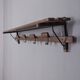 Vintage 1960s wall coat rack in metal and wood, italian design