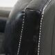 Armchair in black grained cowhide leather with a deep seat