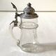 Bohemian crystal beer mug with chiseled pewter lid