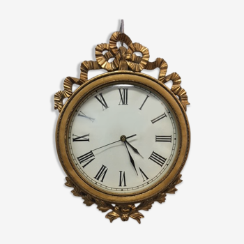 Horloge en bois doré