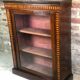 Low English style showcase/bookcase in mahogany and mahogany veneer 1930