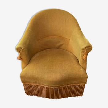 Fauteuil velours à frange