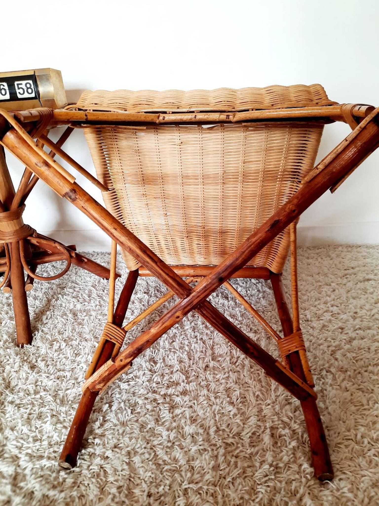 1950s 60s rattan armchair with green apple and black piping.