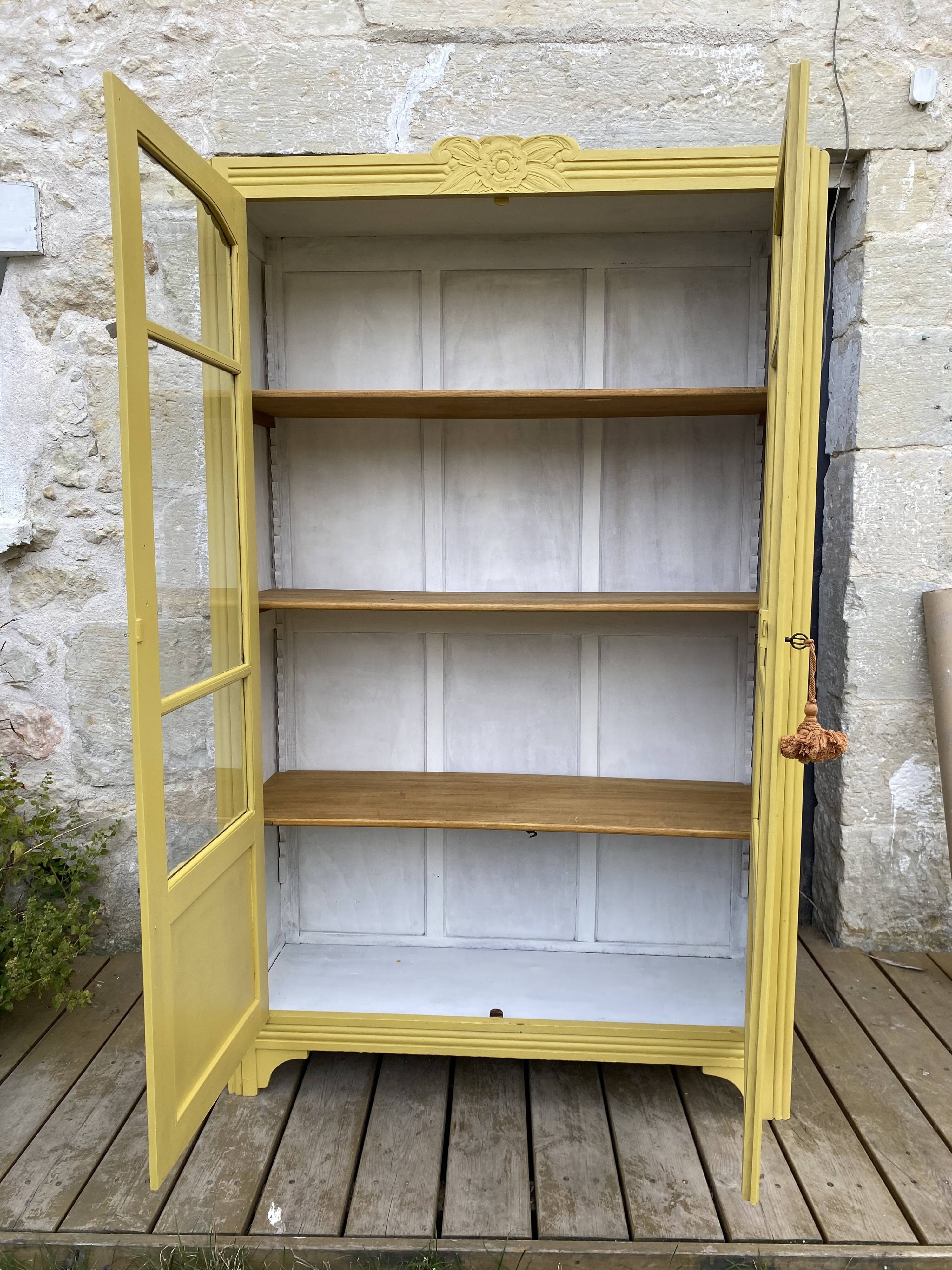Antique yellow display cabinet