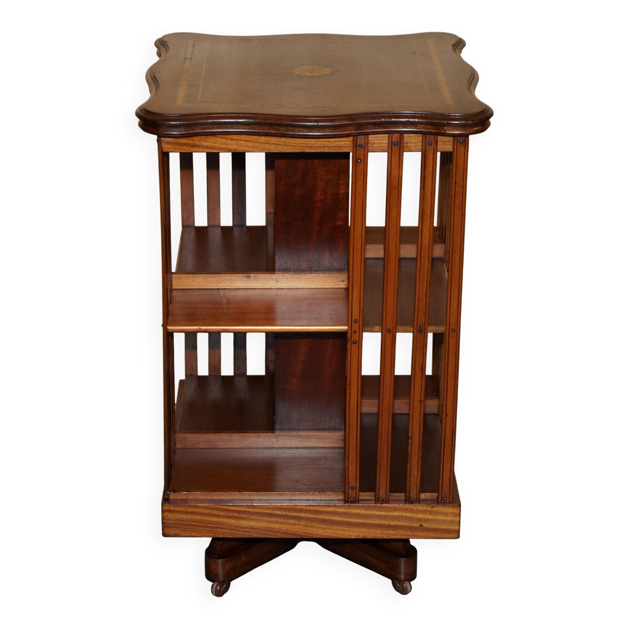Sheraton-style rotating library table in walnut and satinwood.