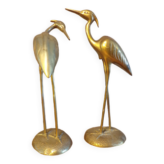 2 brass herons