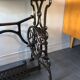 Ancient table, cast iron footing