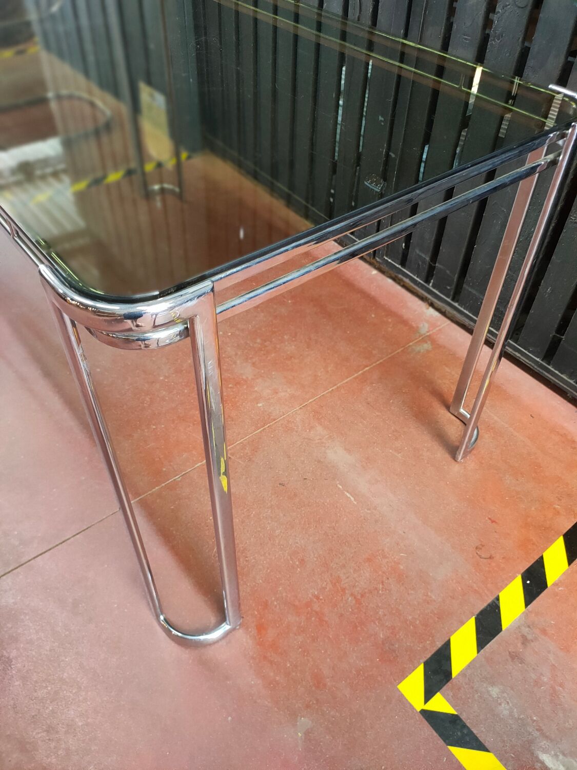 Vintage Italian table with tubular frame and smoked glass, 1970