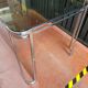 Vintage Italian table with tubular frame and smoked glass, 1970