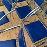 Set of 6 blue chairs with design curves
