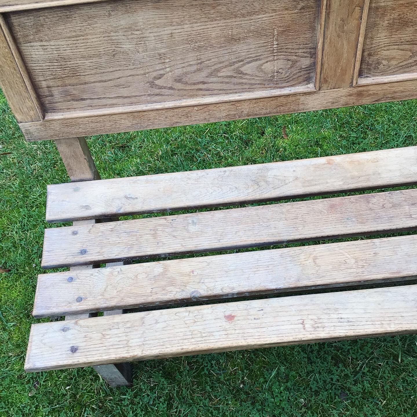 Wooden bench with back